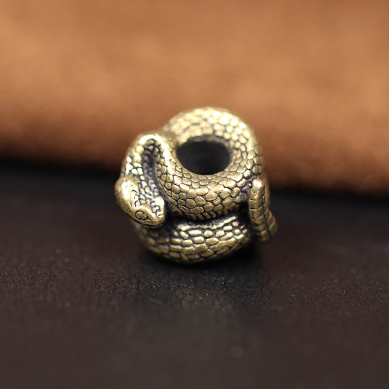 Brass Rattlesnake Beard Bead